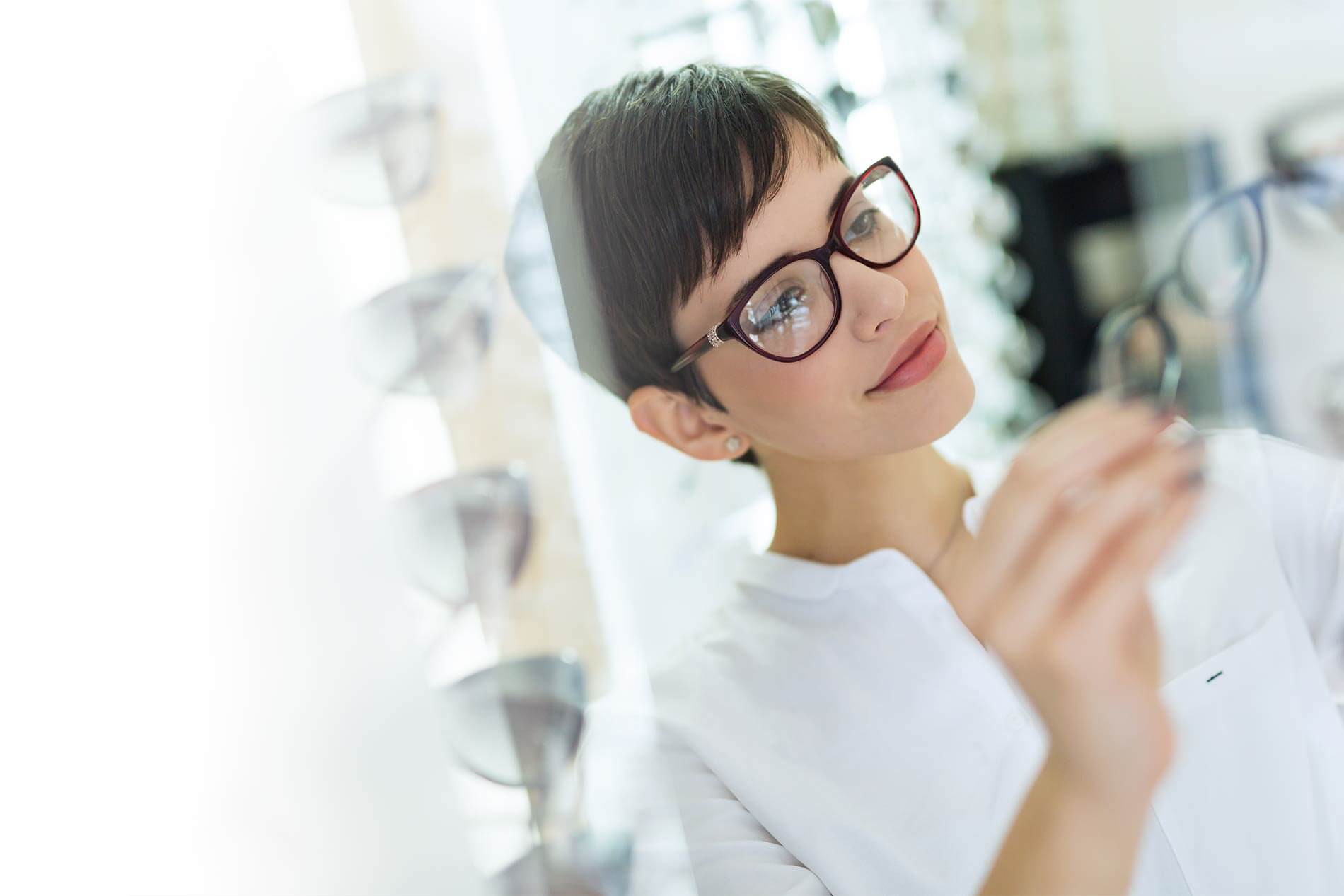 Woman Looking at Glasses
