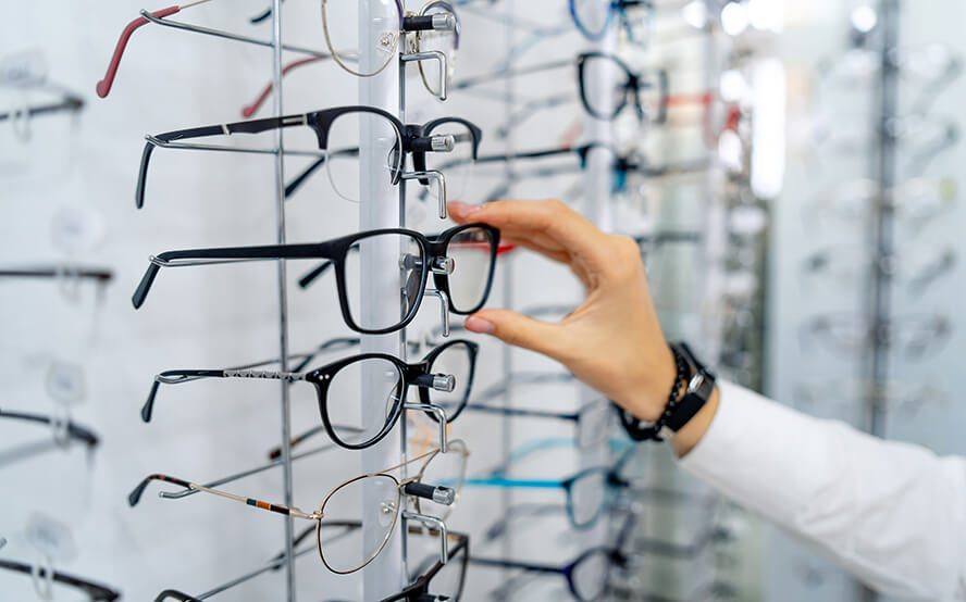 Person Picking Out Glasses in an Optical Shop