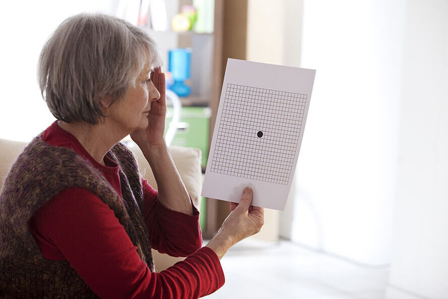 Woman Looking at an Amsler Grid